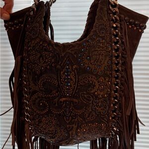 Kippy’s authentic - Fringe Embossed Fleur de lis  leather Shoulder Bag
